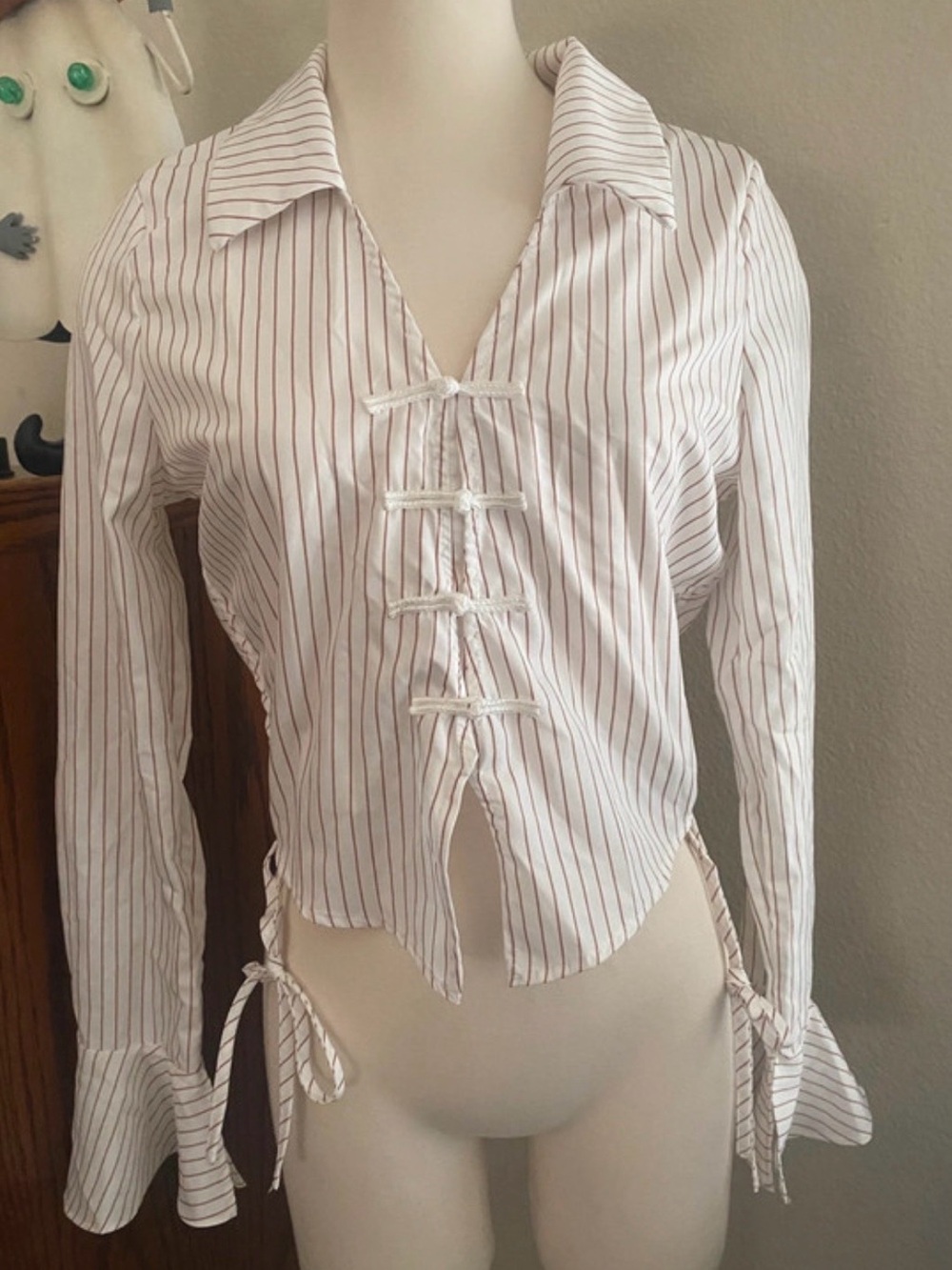 Striped Tie-Front Long Sleeve Top - White with Taupe Stripes and Bell Sleeves.